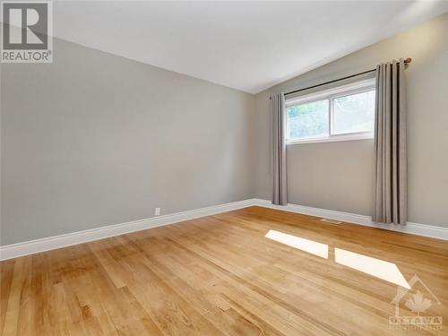 Primary bedroom w/bright window - 4 Bowmoor Avenue, Ottawa, ON - Indoor Photo Showing Other Room