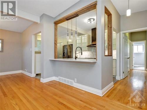 View to the kitchen with the breakfast bar - 4 Bowmoor Avenue, Ottawa, ON - Indoor Photo Showing Other Room