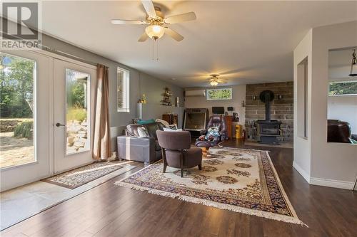 21 Des Perdrix, Grand-Barachois, NB - Indoor Photo Showing Other Room With Fireplace