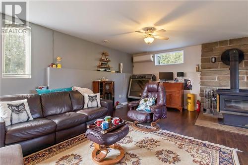 21 Des Perdrix, Grand-Barachois, NB - Indoor Photo Showing Living Room With Fireplace