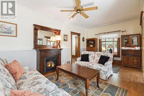 13 Victoria Street, Bayham (Port Burwell), ON - Indoor Photo Showing Living Room With Fireplace