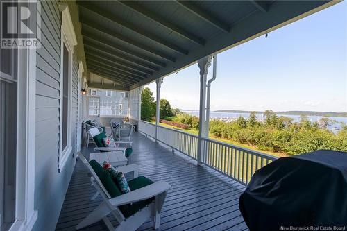 65 Gondola Point Road, Rothesay, NB - Outdoor With Body Of Water With Deck Patio Veranda With Exterior