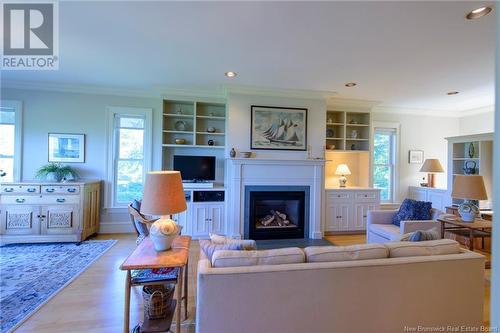 65 Gondola Point Road, Rothesay, NB - Indoor Photo Showing Living Room With Fireplace