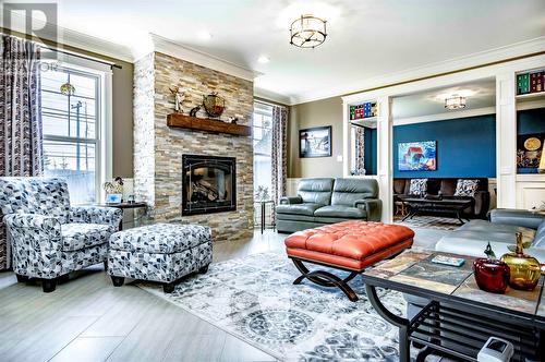 12 Drummond Place, Paradise, NL - Indoor Photo Showing Living Room With Fireplace