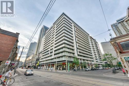 729 - 111 Elizabeth Street, Toronto (Bay Street Corridor), ON - Outdoor With Balcony With Facade