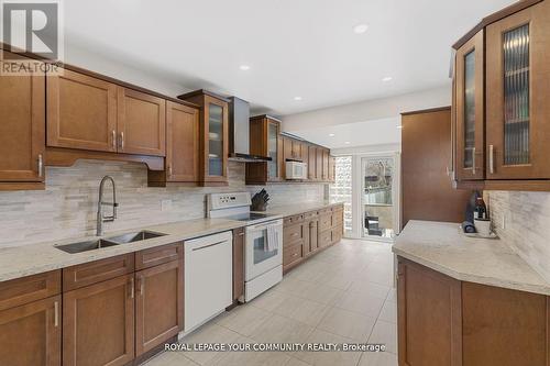 11 Denton Avenue, Toronto (Crescent Town), ON - Indoor Photo Showing Kitchen With Double Sink