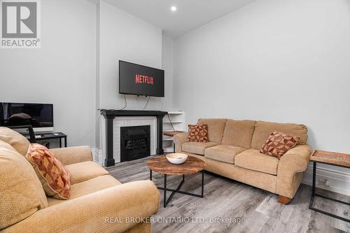 300-302 Oxford Street E, London, ON - Indoor Photo Showing Living Room With Fireplace