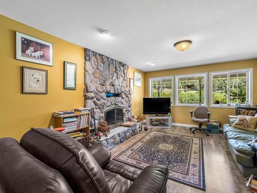 9780 Highway 97 C, Merritt, BC - Indoor Photo Showing Living Room With Fireplace