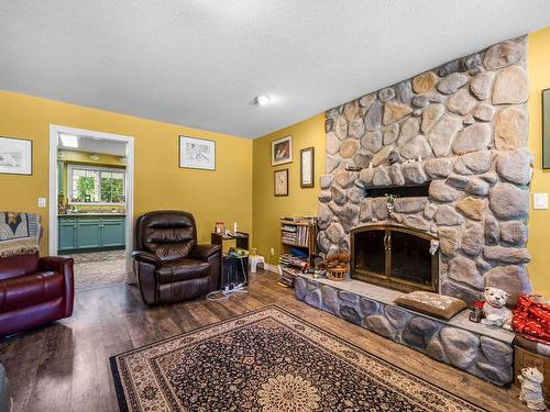 9780 Highway 97 C, Merritt, BC - Indoor Photo Showing Living Room With Fireplace