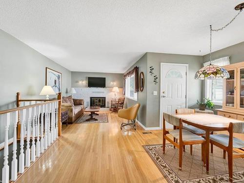 2365 Bossert Ave, Kamloops, BC - Indoor Photo Showing Dining Room With Fireplace