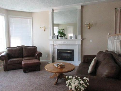 1721 Bann Street, Merritt, BC - Indoor Photo Showing Living Room With Fireplace