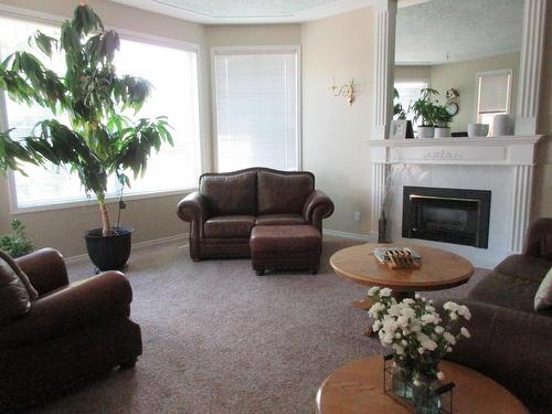 1721 Bann Street, Merritt, BC - Indoor Photo Showing Living Room With Fireplace