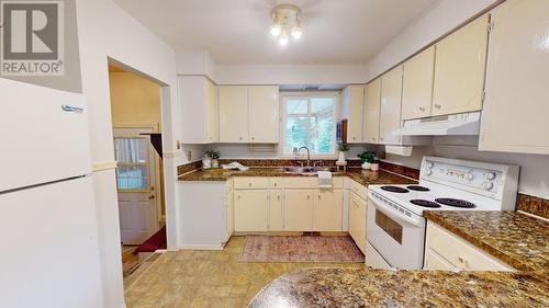 9803 Willow Road, Fort St. John, BC - Indoor Photo Showing Kitchen With Double Sink