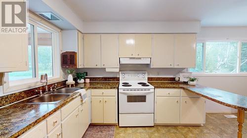 9803 Willow Road, Fort St. John, BC - Indoor Photo Showing Kitchen With Double Sink