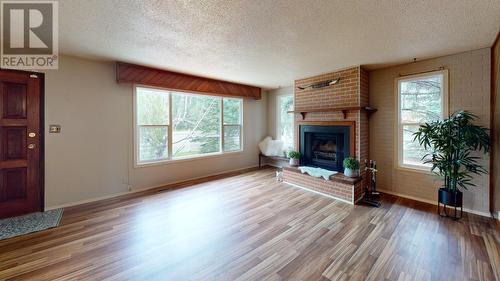 9803 Willow Road, Fort St. John, BC - Indoor Photo Showing Living Room With Fireplace