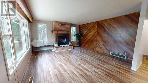 9803 Willow Road, Fort St. John, BC - Indoor Photo Showing Living Room With Fireplace