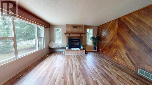 9803 Willow Road, Fort St. John, BC - Indoor Photo Showing Living Room With Fireplace