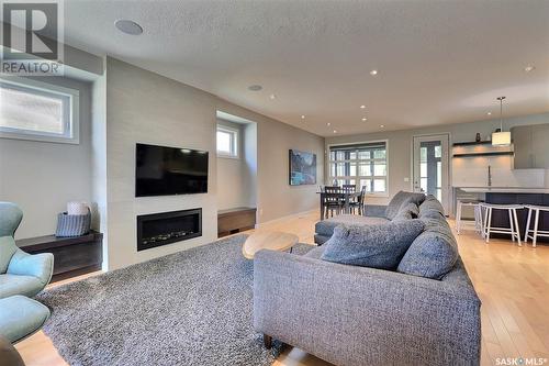 4214 Skinner Court, Regina, SK - Indoor Photo Showing Living Room With Fireplace