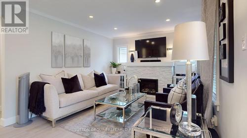 79 Trevithen Street, London, ON - Indoor Photo Showing Living Room With Fireplace