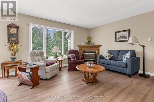 16 Garden Drive, West Lincoln, ON - Indoor Photo Showing Living Room With Fireplace