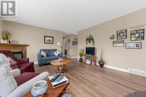 16 Garden Drive, West Lincoln, ON - Indoor Photo Showing Living Room With Fireplace