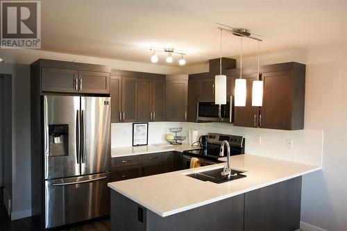 302 6798 Westgate Avenue, Prince George, BC - Indoor Photo Showing Kitchen With Double Sink