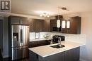 302 6798 Westgate Avenue, Prince George, BC  - Indoor Photo Showing Kitchen With Double Sink 