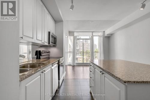 309 - 225 Webb Drive, Mississauga (City Centre), ON - Indoor Photo Showing Kitchen With Double Sink