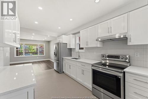 1439 Benjamin Unit# Main, Windsor, ON - Indoor Photo Showing Kitchen With Double Sink