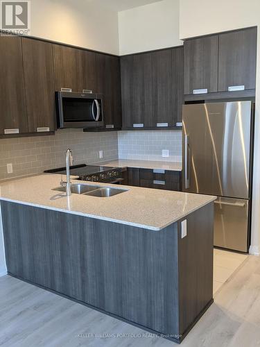 112 - 35 Watergarden Drive, Mississauga, ON - Indoor Photo Showing Kitchen With Stainless Steel Kitchen With Double Sink