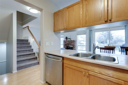 115-133 Wyndham Crescent, Kelowna, BC - Indoor Photo Showing Kitchen With Double Sink