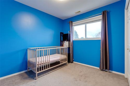 115-133 Wyndham Crescent, Kelowna, BC - Indoor Photo Showing Bedroom