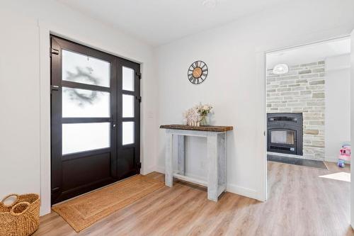 7864 Alpine Road, Kelowna, BC - Indoor Photo Showing Other Room With Fireplace