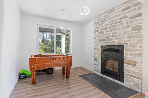 7864 Alpine Road, Kelowna, BC - Indoor With Fireplace