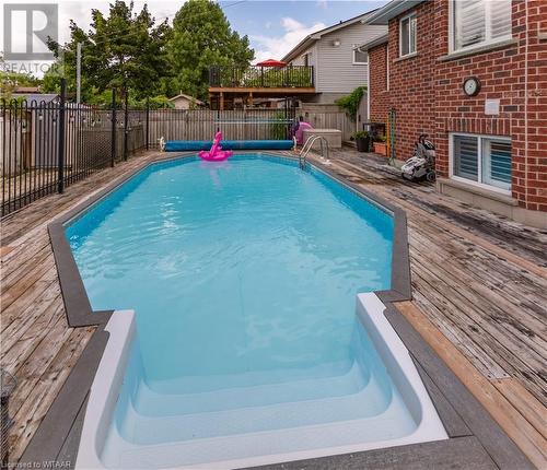 21 Heron Avenue, Woodstock, ON - Outdoor With In Ground Pool With Exterior