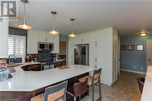 21 Heron Avenue, Woodstock, ON - Indoor Photo Showing Kitchen With Upgraded Kitchen