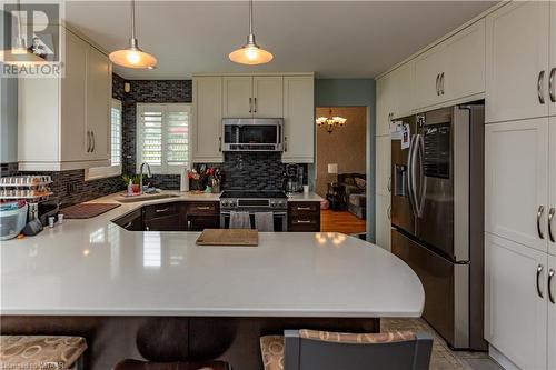 21 Heron Avenue, Woodstock, ON - Indoor Photo Showing Kitchen With Upgraded Kitchen