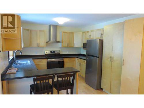 1310 Twan Avenue, Quesnel, BC - Indoor Photo Showing Kitchen With Double Sink