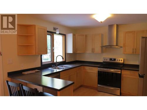 1310 Twan Avenue, Quesnel, BC - Indoor Photo Showing Kitchen With Double Sink