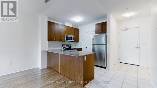 223 - 7400 Markham Road, Markham (Cedarwood), ON - Indoor Photo Showing Kitchen With Stainless Steel Kitchen