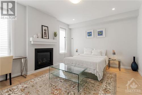 851 Cappamore Drive, Ottawa, ON - Indoor Photo Showing Bedroom With Fireplace