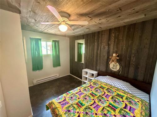 10 Slocruz Drive, Sandy Lake, MB - Indoor Photo Showing Bedroom