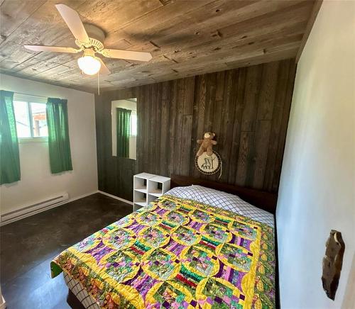 10 Slocruz Drive, Sandy Lake, MB - Indoor Photo Showing Bedroom