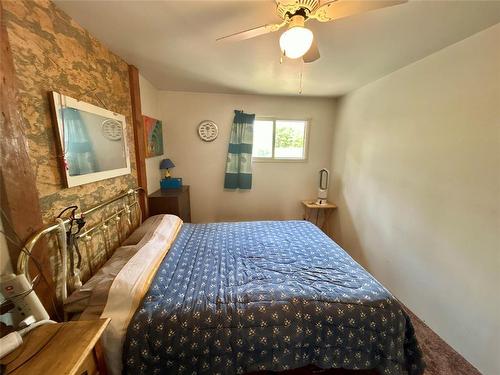 10 Slocruz Drive, Sandy Lake, MB - Indoor Photo Showing Bedroom