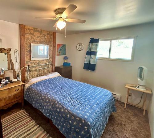 10 Slocruz Drive, Sandy Lake, MB - Indoor Photo Showing Bedroom