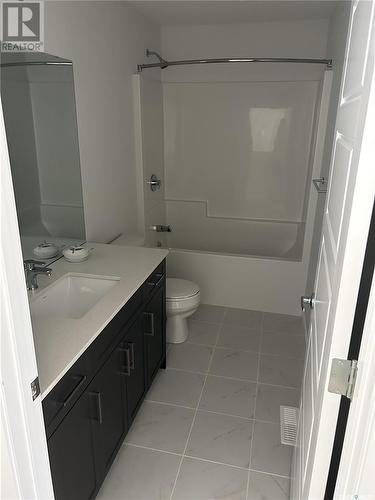 103 Aniskotaw Place, Saskatoon, SK - Indoor Photo Showing Bathroom