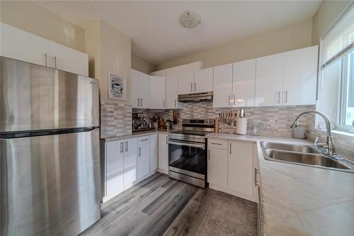 796 Simcoe Street, Winnipeg, MB - Indoor Photo Showing Kitchen With Double Sink