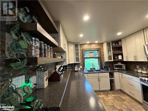 296 High St, Mactier, ON - Indoor Photo Showing Kitchen With Double Sink