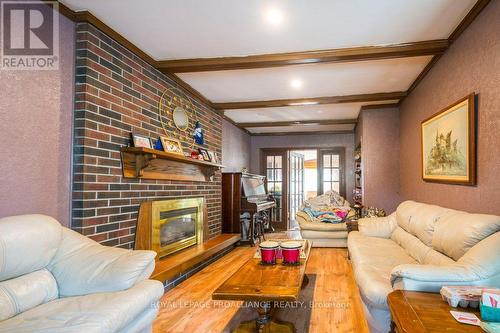 48 North Trent Street, Quinte West, ON - Indoor Photo Showing Living Room With Fireplace