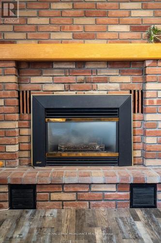 8600 Halle Road, Hamilton Township, ON - Indoor With Fireplace